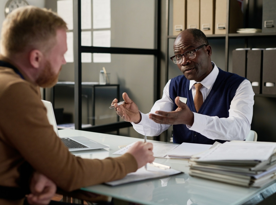 Attorney consulting client in office